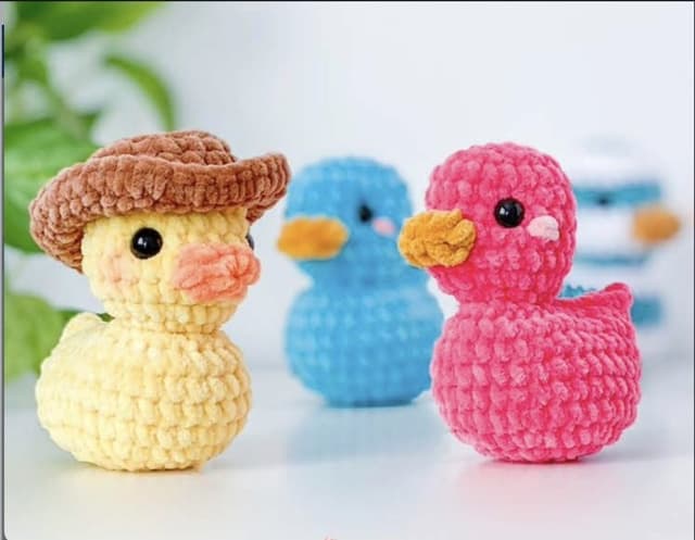 Colorful handmade crochet ducks by Sterling Crafted